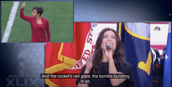 Treshelle, a black woman with black short hair signs the national anthem in ASL and is wearing a red long sleeved shirt in the upper left corner of the screen. On the main screen, Idina Menzel signs the national anthem. SHe is caucasian with brown shoulder length hair and a black dress.